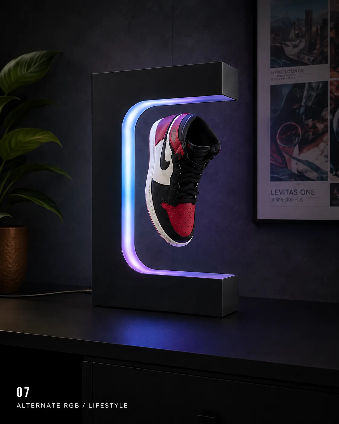 The display glowing purple and blue on a desk setup